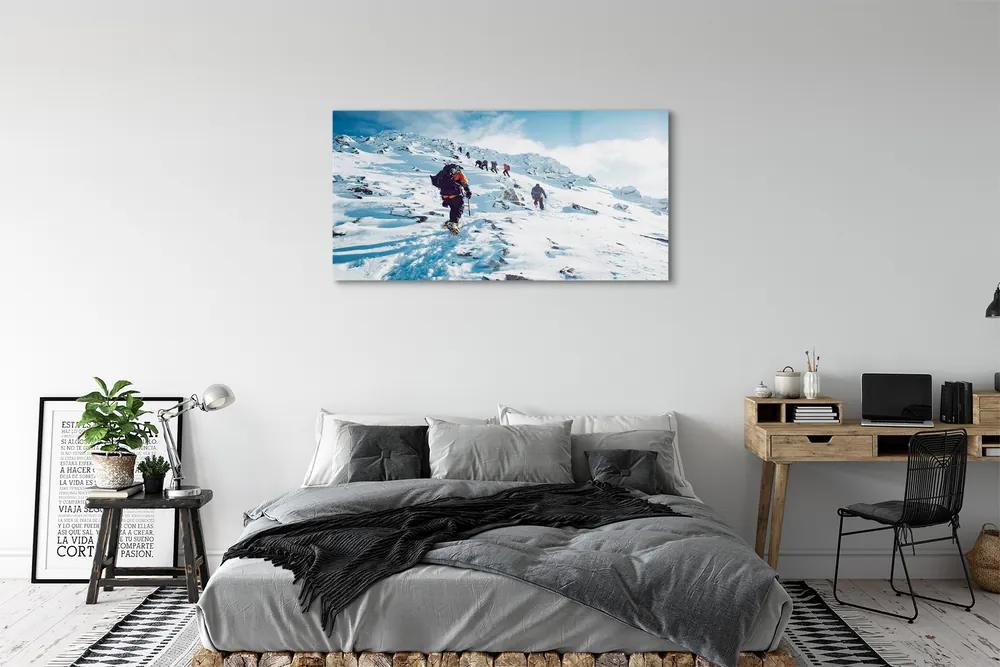 Obraz plexi Lezenie na hory v zime 125x50 cm