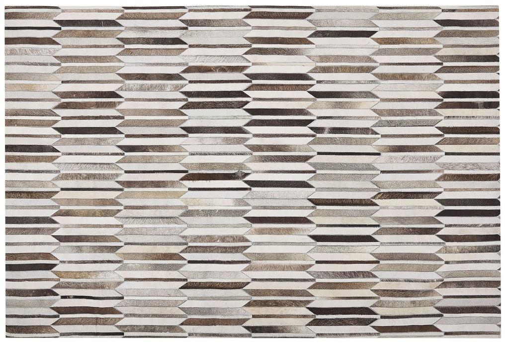 Kožený koberec 140 x 200 cm hnedá/béžová KULALAR Beliani