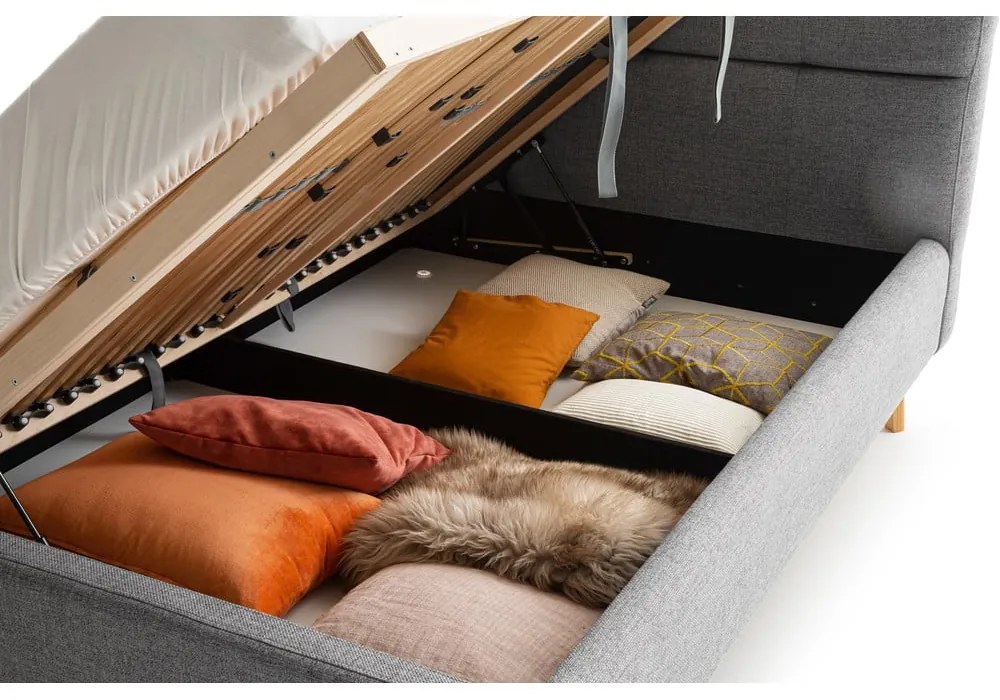 Sivá čalúnená dvojlôžková posteľ s úložným priestorom s roštom 180x200 cm Lotte – Meise Möbel