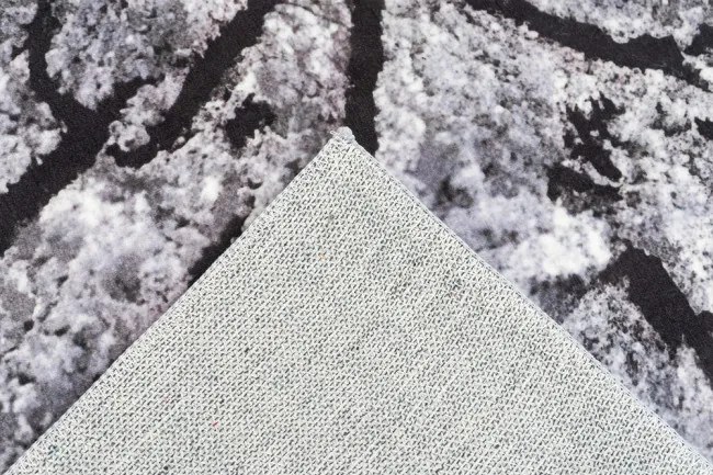 Protišmykový koberec NOVO peň / sivý