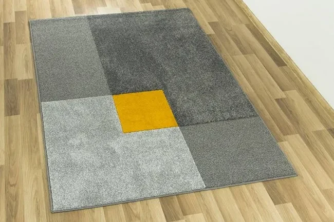 Koberec Agnella Meteo Nelio 3D zlatý