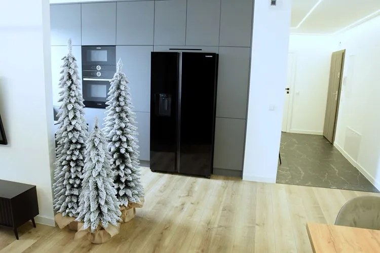Dekorstudio Umelý Vianočný stromček Smrek štíhly zasnežený 120cm