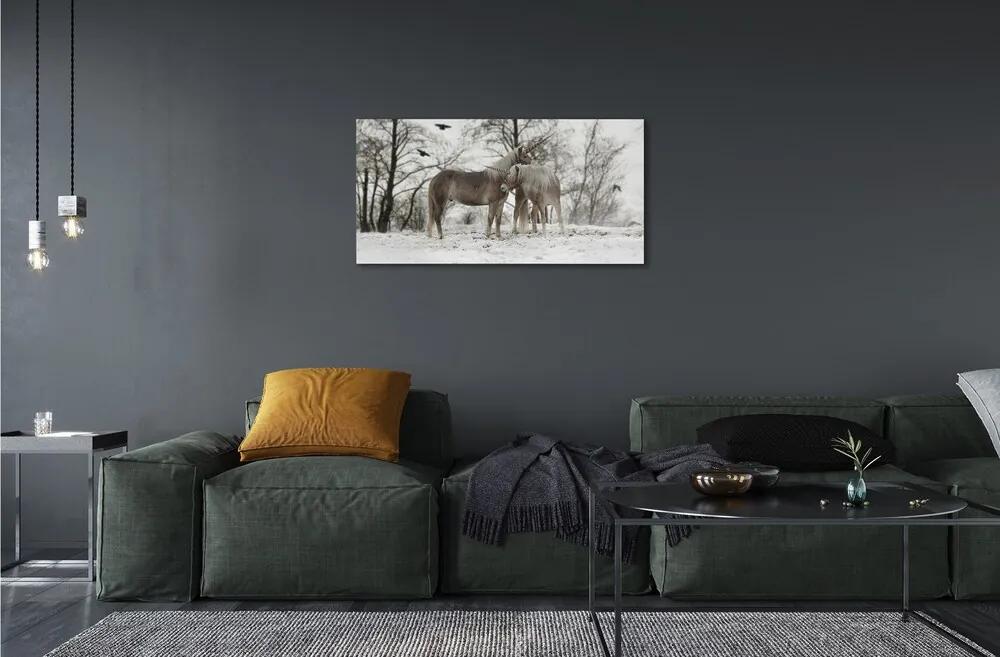 Sklenený obraz Zimný lesné jednorožce 125x50 cm