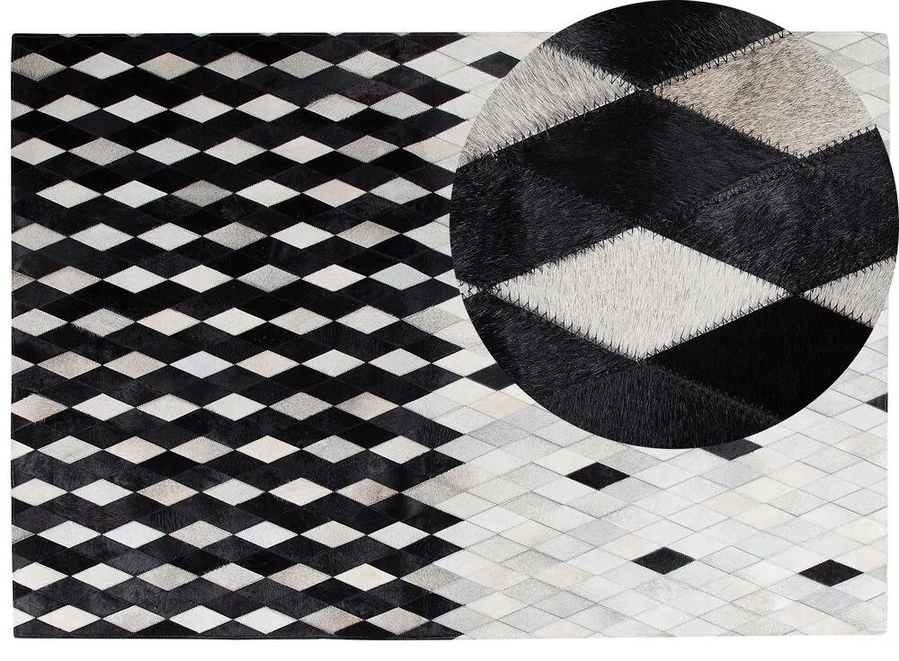 Kožený koberec 160 x 230 cm biela/čierna/béžová MALDAN Beliani