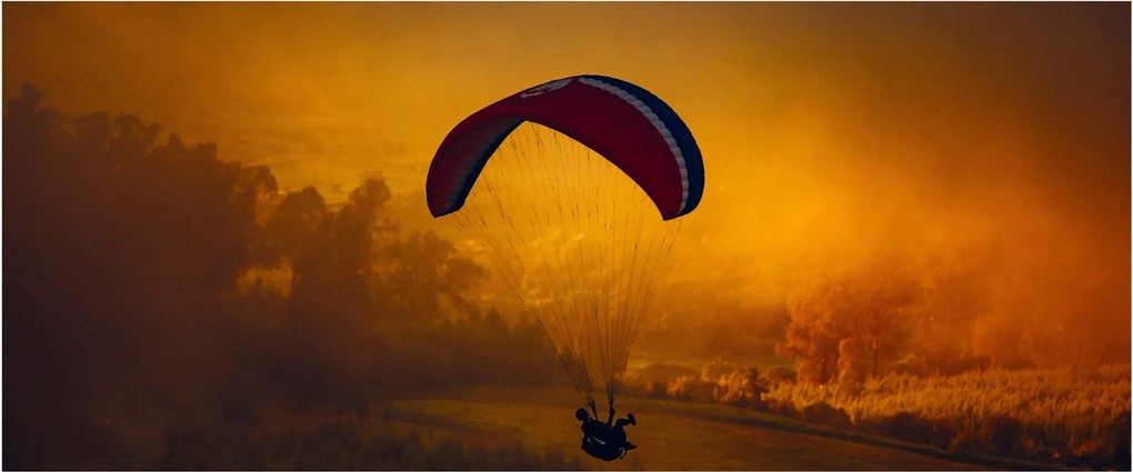 Obraz parašutistu v západe slnka (120x50 cm)