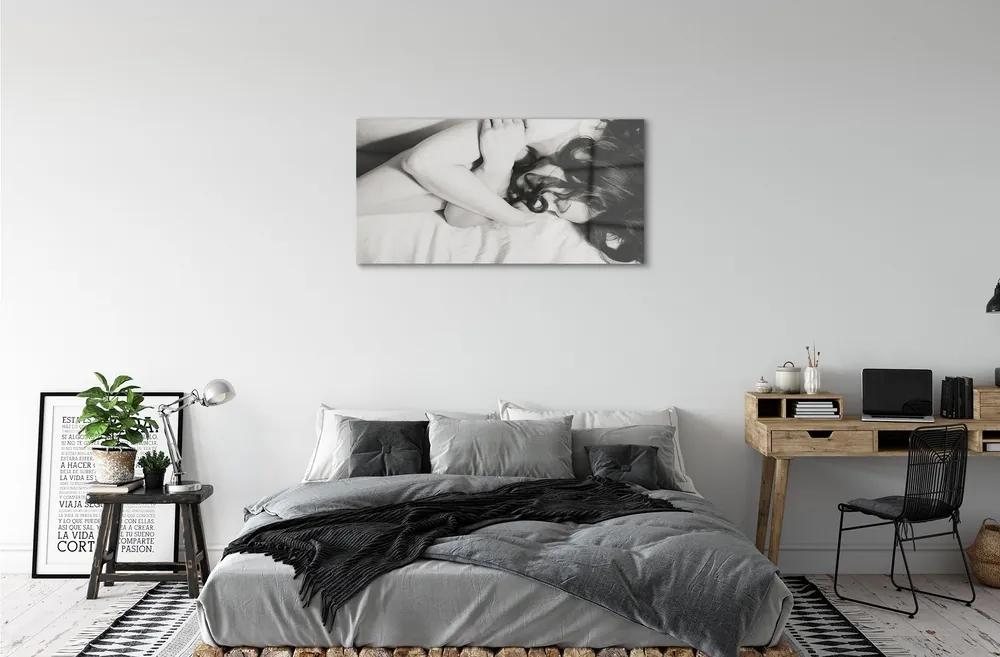 Obraz na skle spiace ženu 100x50 cm