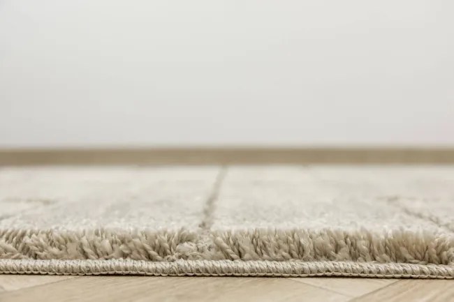 Kúpeľňový koberček Inez béžový, geometrický