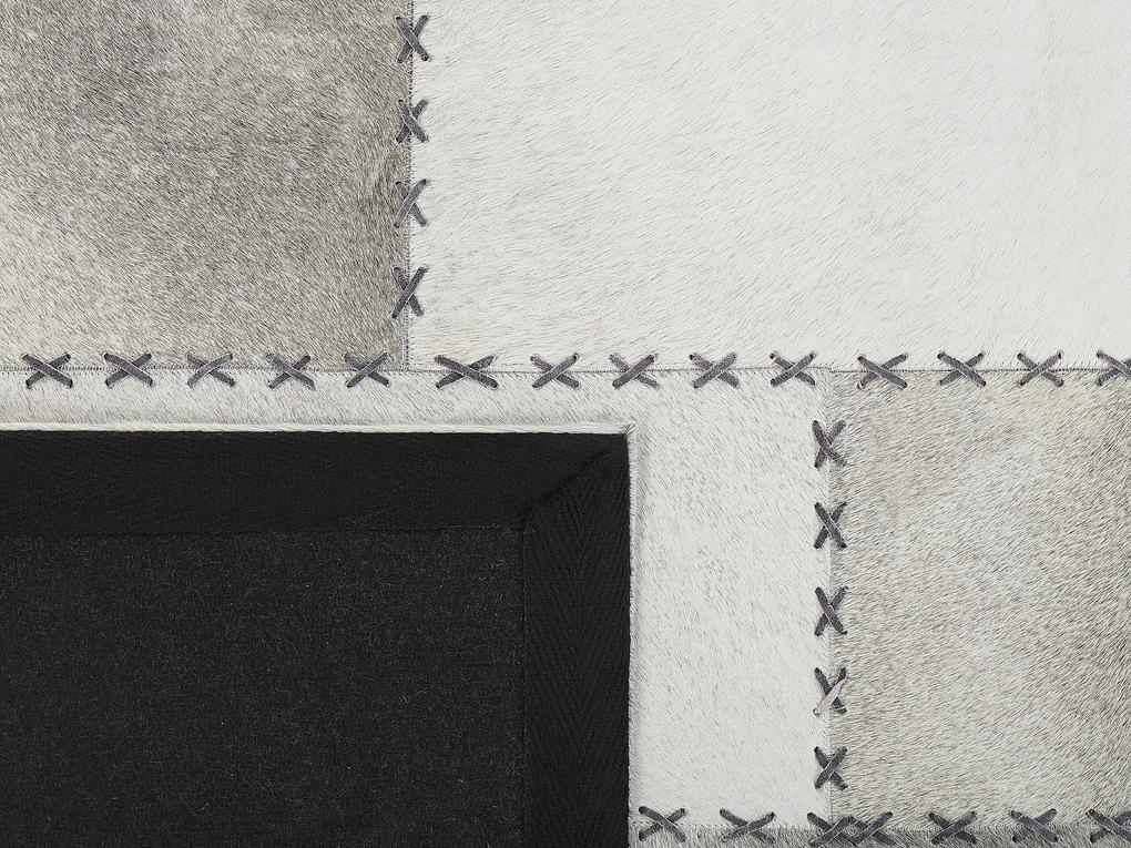 Kožený koberec 140 x 200 cm hnedá/sivá PERVARI Beliani