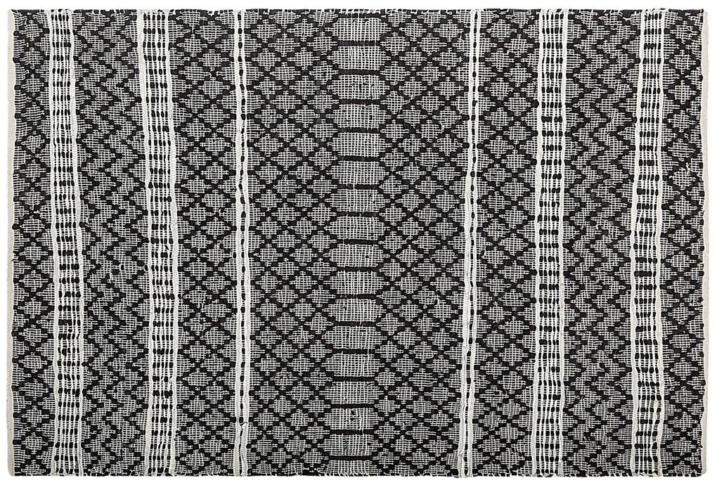 Kožený koberec 140 x 200 cm čierna/béžová FEHIMLI Beliani
