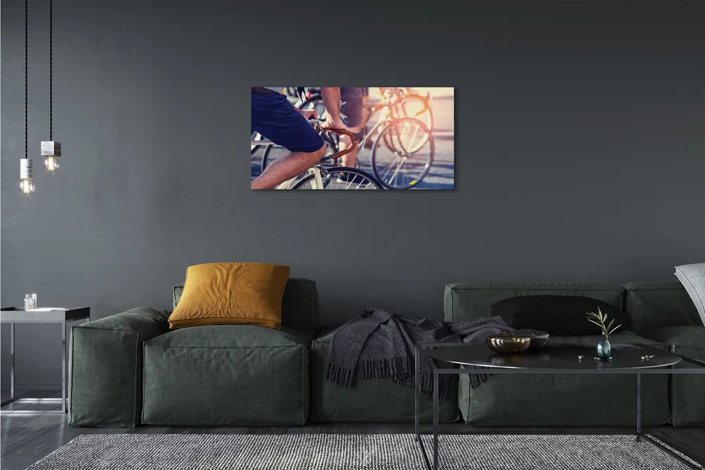 Obraz canvas cyklisti ľudí 120x60 cm