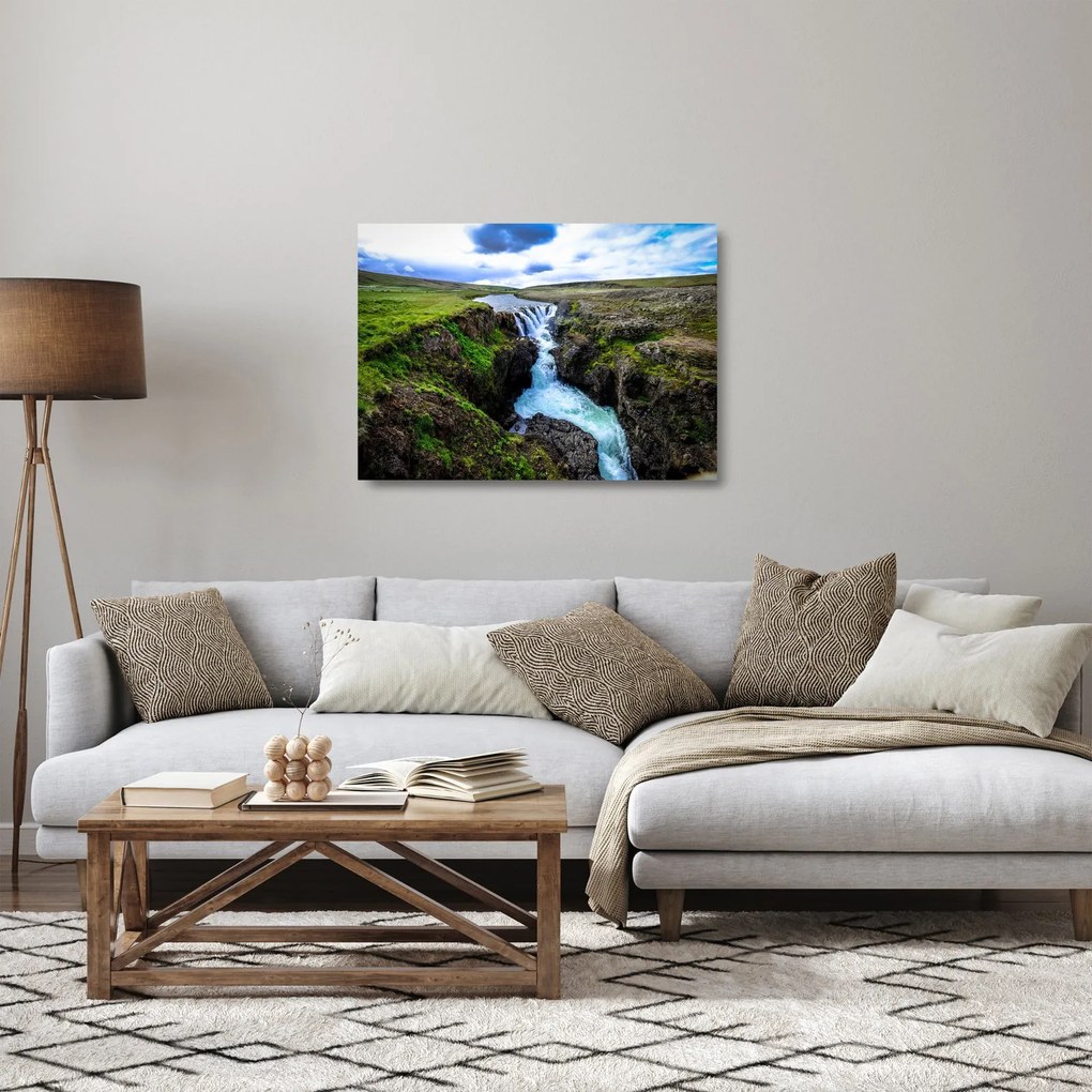 Sklenený obraz vodopádu medzi skalami (70x50 cm)