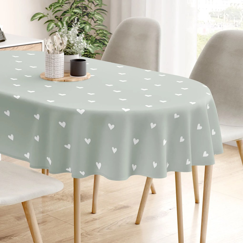 Goldea oválny obrus 100% bavlnené plátno - srdiečka na šalviovo zelenom 120 x 200 cm