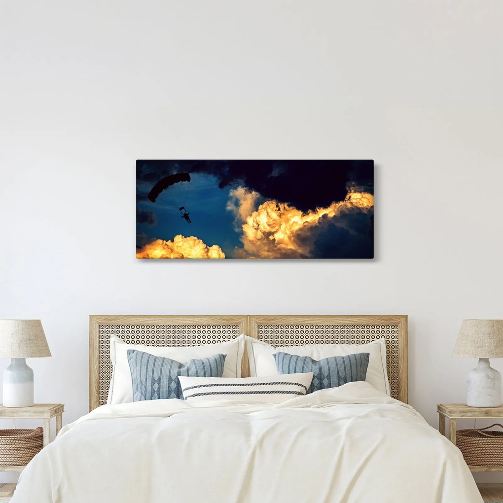 Obraz parašutistu v oblakoch (120x50 cm)
