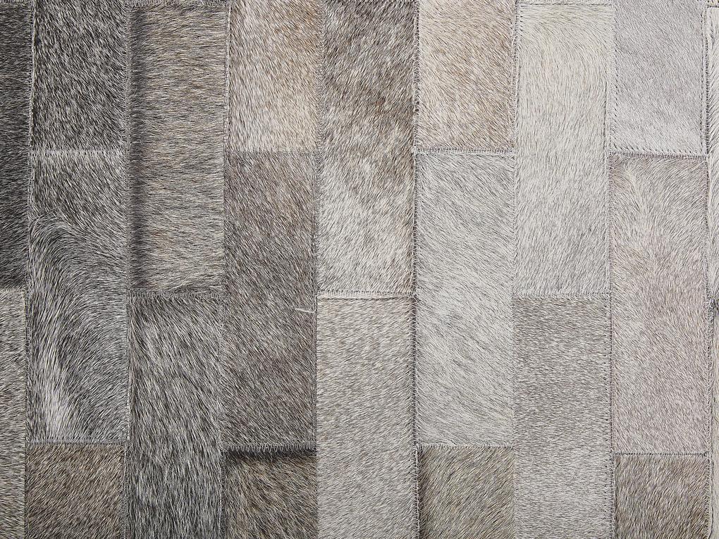Okrúhly kožený koberec ⌀ 140 cm hnedá/béžová DUTLAR Beliani
