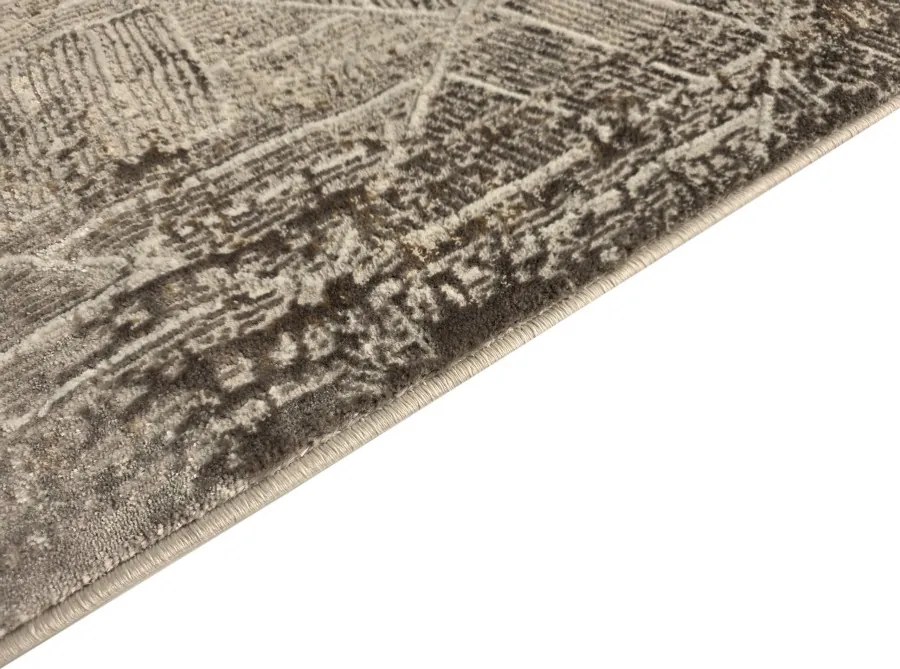 DC Koberec Oman 618 tmavá vizion zlatá Rozmer: 120×170 cm