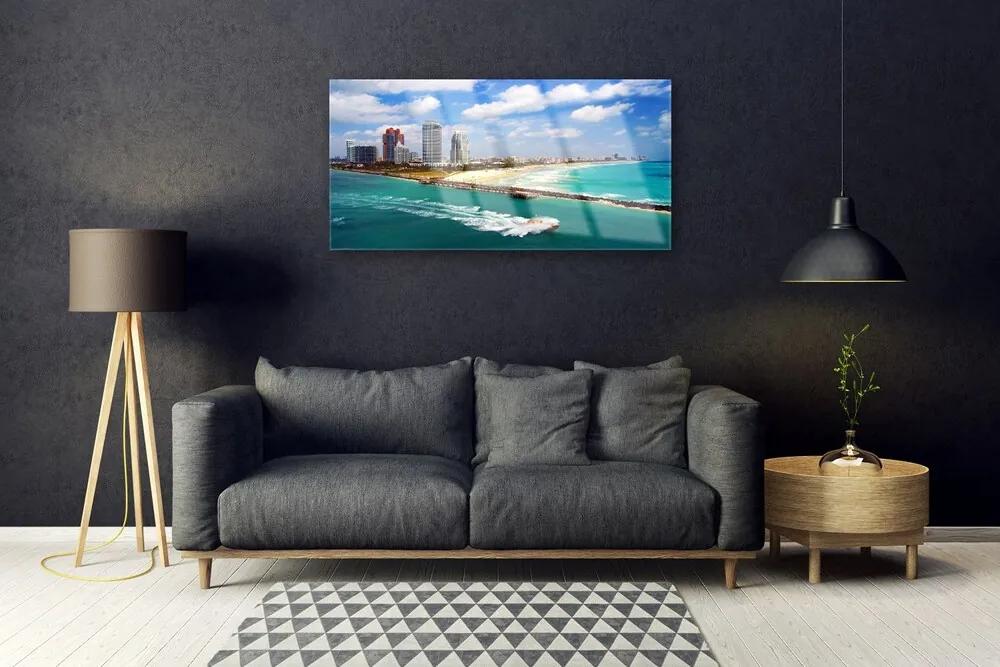 Obraz na akrylátovom skle More pláž mesto krajina 100x50 cm