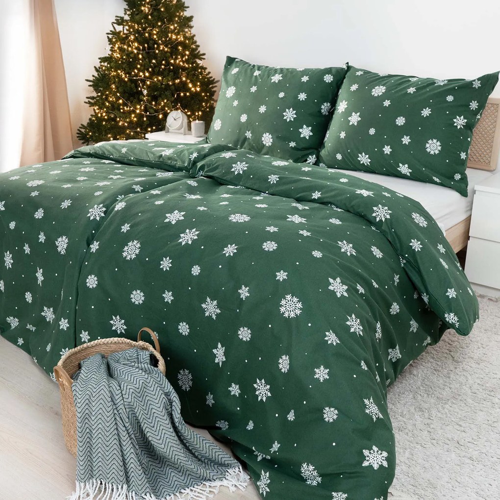 Goldea flanelové posteľné obliečky - snehové vločky na zelenej 140 x 200 a 70 x 90 cm