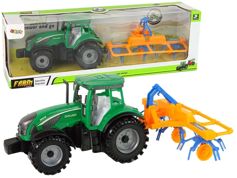 Lean Toys Zelený traktor s hrabľami na seno – trecí pohon