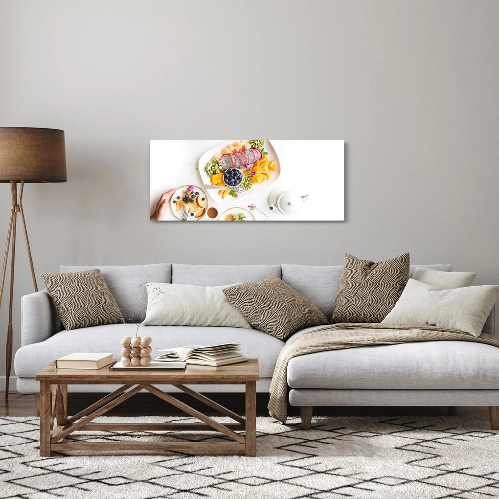 Obraz tanierov s ovocím na stole (120x50 cm)