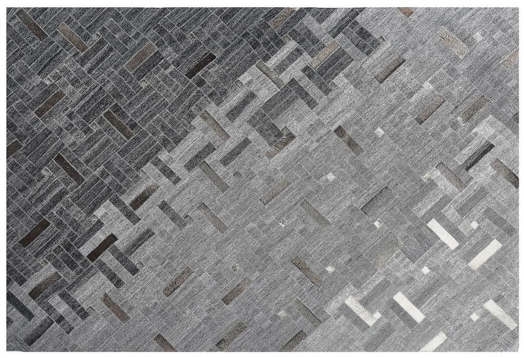 Kožený koberec 140 x 200 cm sivý DARA Beliani