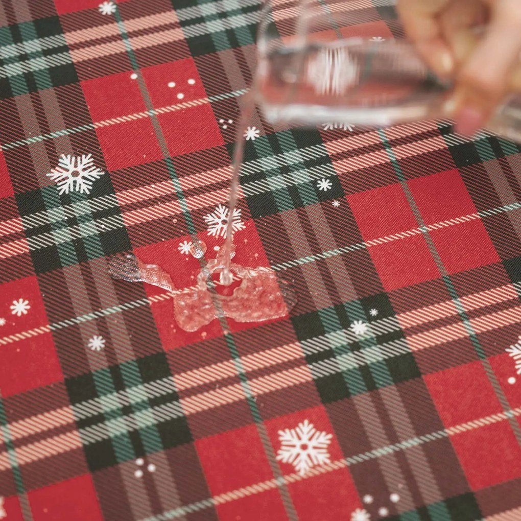 Goldea vianočný hranatý teflónový obrus - červené káro s vločkami 140 x 220 cm