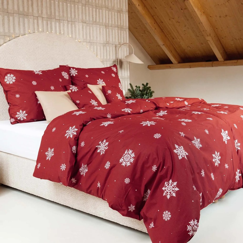Goldea bavlnené posteľné obliečky - snehové vločky na červenej 150 x 200 a 50 x 60 cm