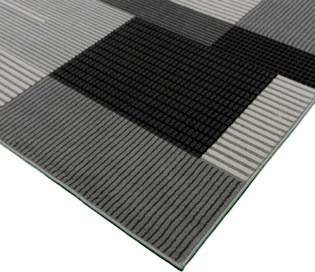 Koberec Lotus 9303 GREY – sivočierny obdĺžnikový koberec Rozmer: 240x330 cm