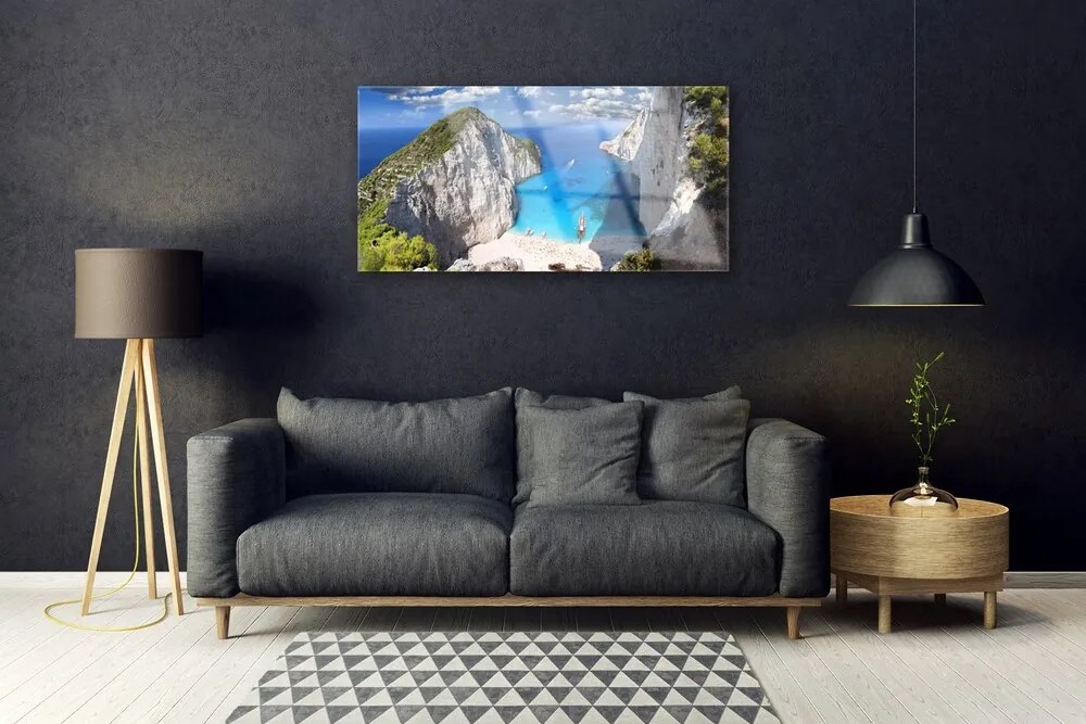 Obraz na akrylátovom skle Záliv hora pláž krajina 100x50 cm