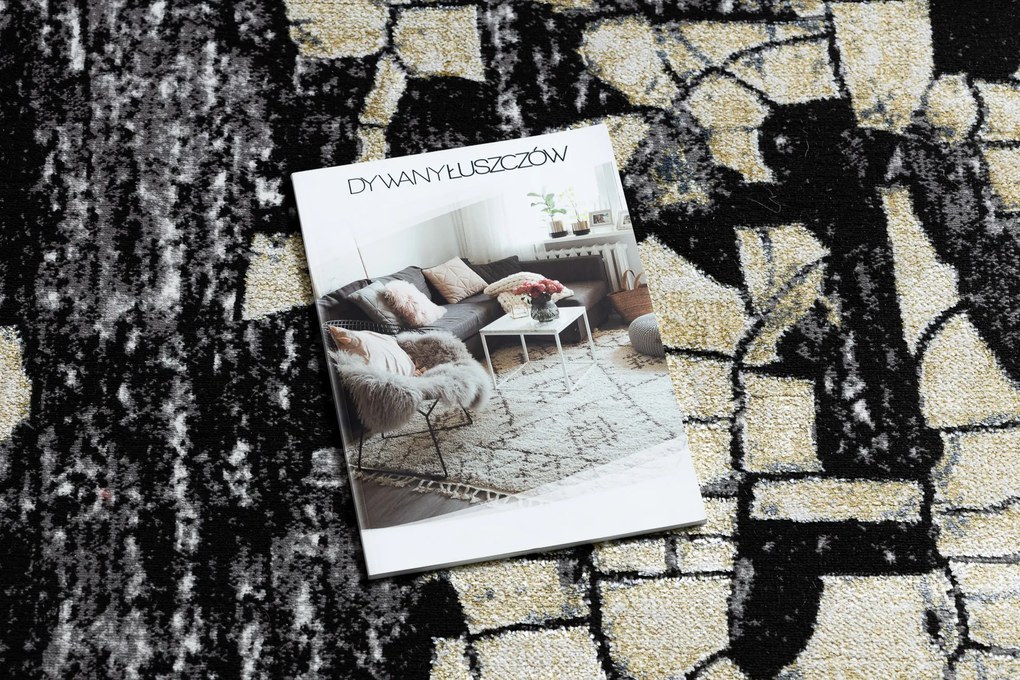 Moderný koberec DE LUXE 2079 Štrukturálny zlatý / sivý