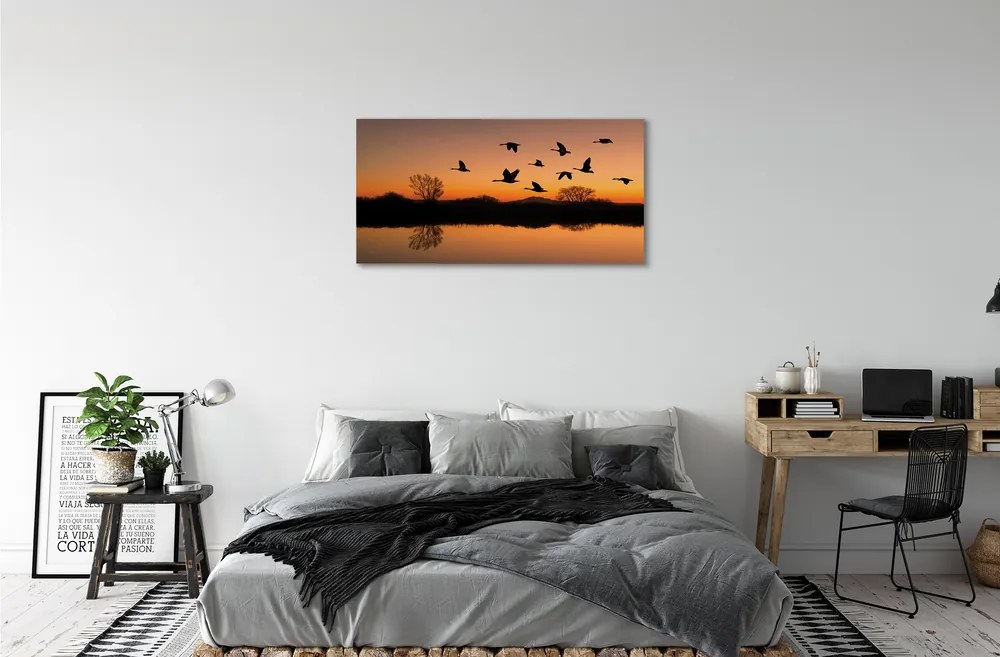 Obraz na plátne Lietajúce vtáky sunset 140x70 cm