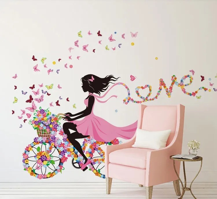 Samolepka na stenu "Dievča s motýľmi na bicykli" 140x70 cm