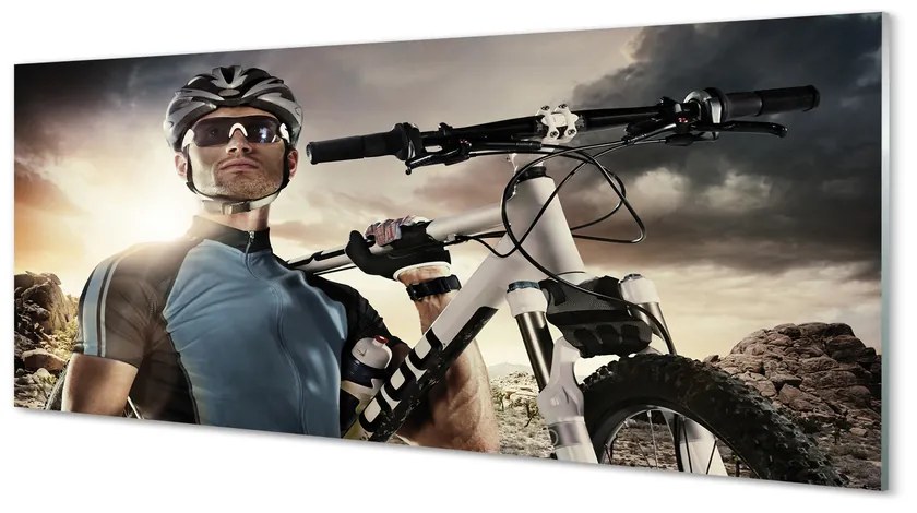 Obraz plexi Cyklista na bicykli mraky 120x60 cm