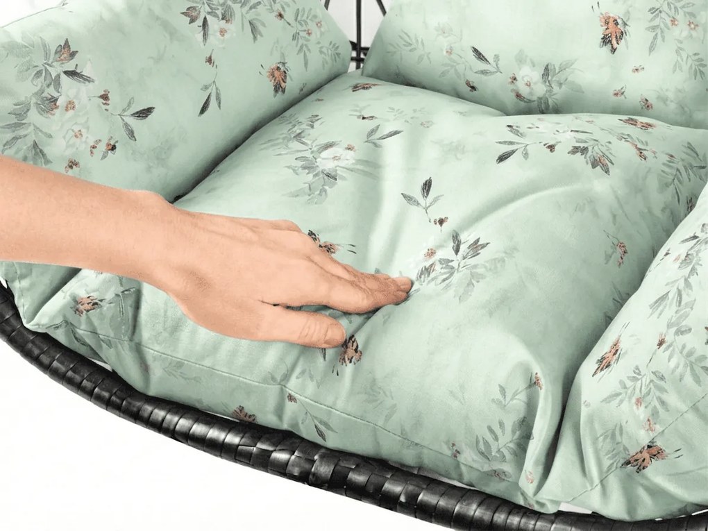 Čierne závesné kreslo KOKON so stojanom, svetlozelený vankúš so vzorom