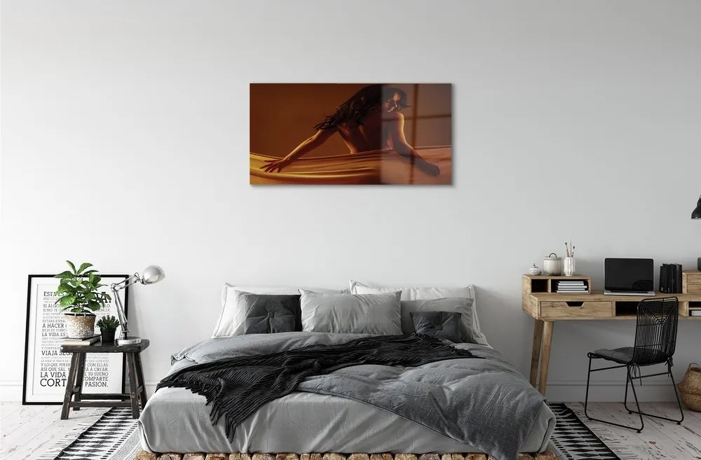 Obraz na skle Žena s materiálom 100x50 cm