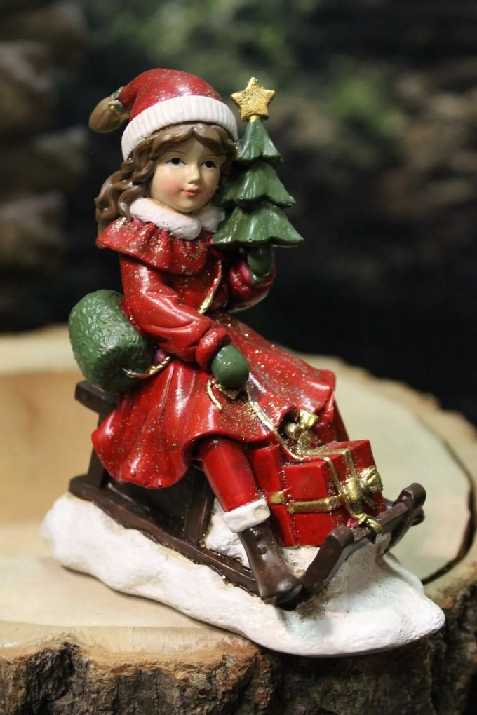 Červená vianočná figúrka dievčatka na sánkach 11cm