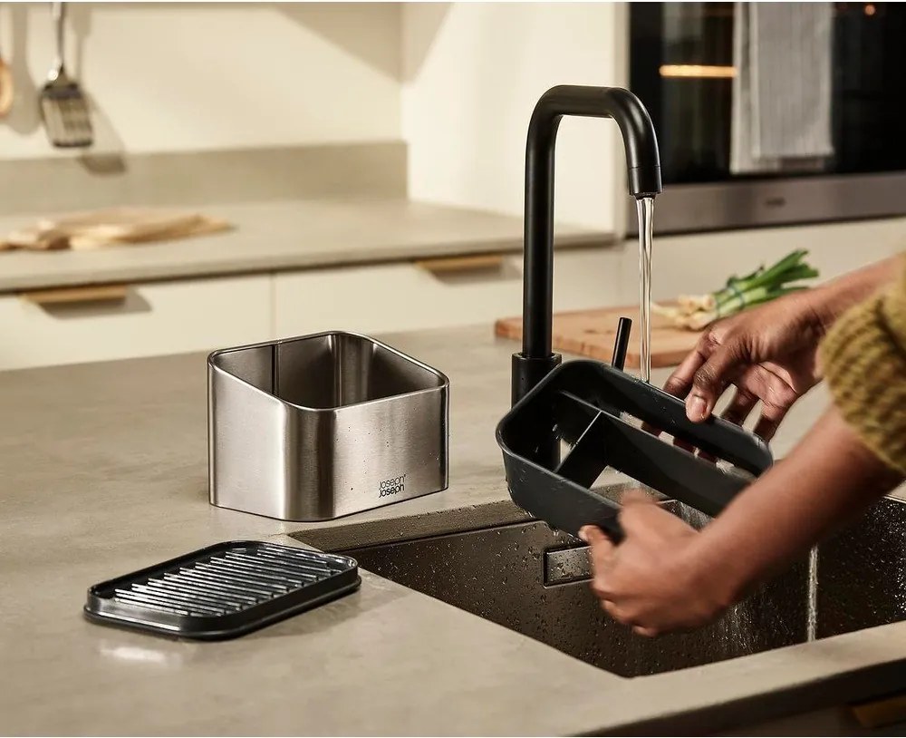 Kovový stojan na umývacie prostriedky v lesklej striebornej farbe Surface – Joseph Joseph