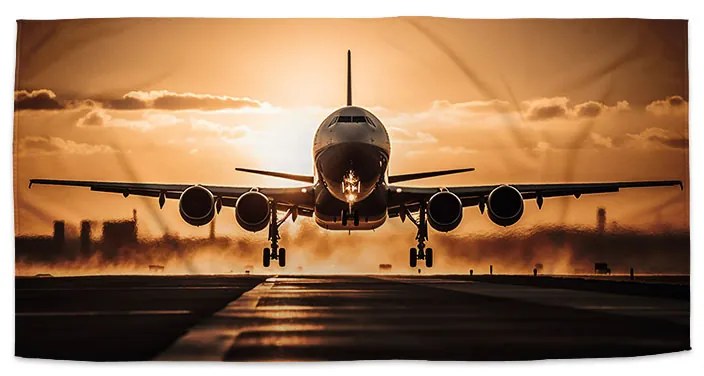Sablio Uterák Lietadlo pristávajúce pri západe slnka - 50x100 cm