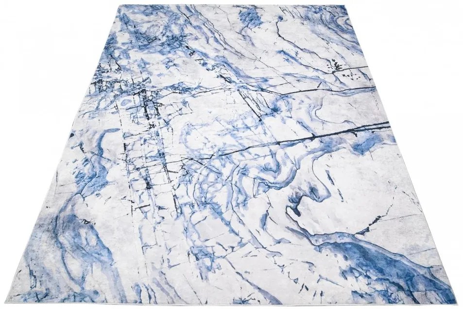 Jednoduchý bielo-modrý koberec s abstraktným vzorom Šírka: 80 cm | Dĺžka: 150 cm