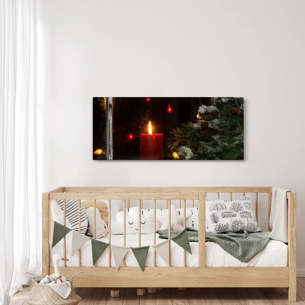 Obraz - Žiariaca vianočná sviečka (120x50 cm)
