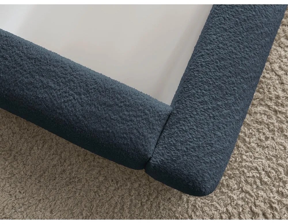 Tmavomodrá čalúnená dvojlôžková posteľ s úložným priestorom s roštom 180x200 cm Orlane – Bobochic Paris