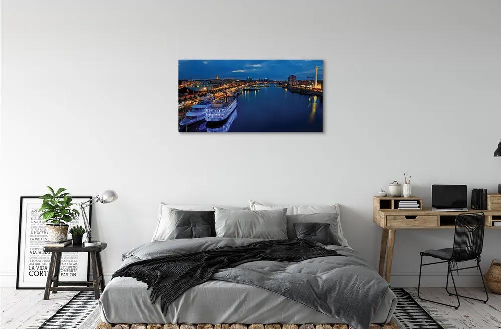 Obraz canvas Loď mora mesto na nočnej oblohe 140x70 cm