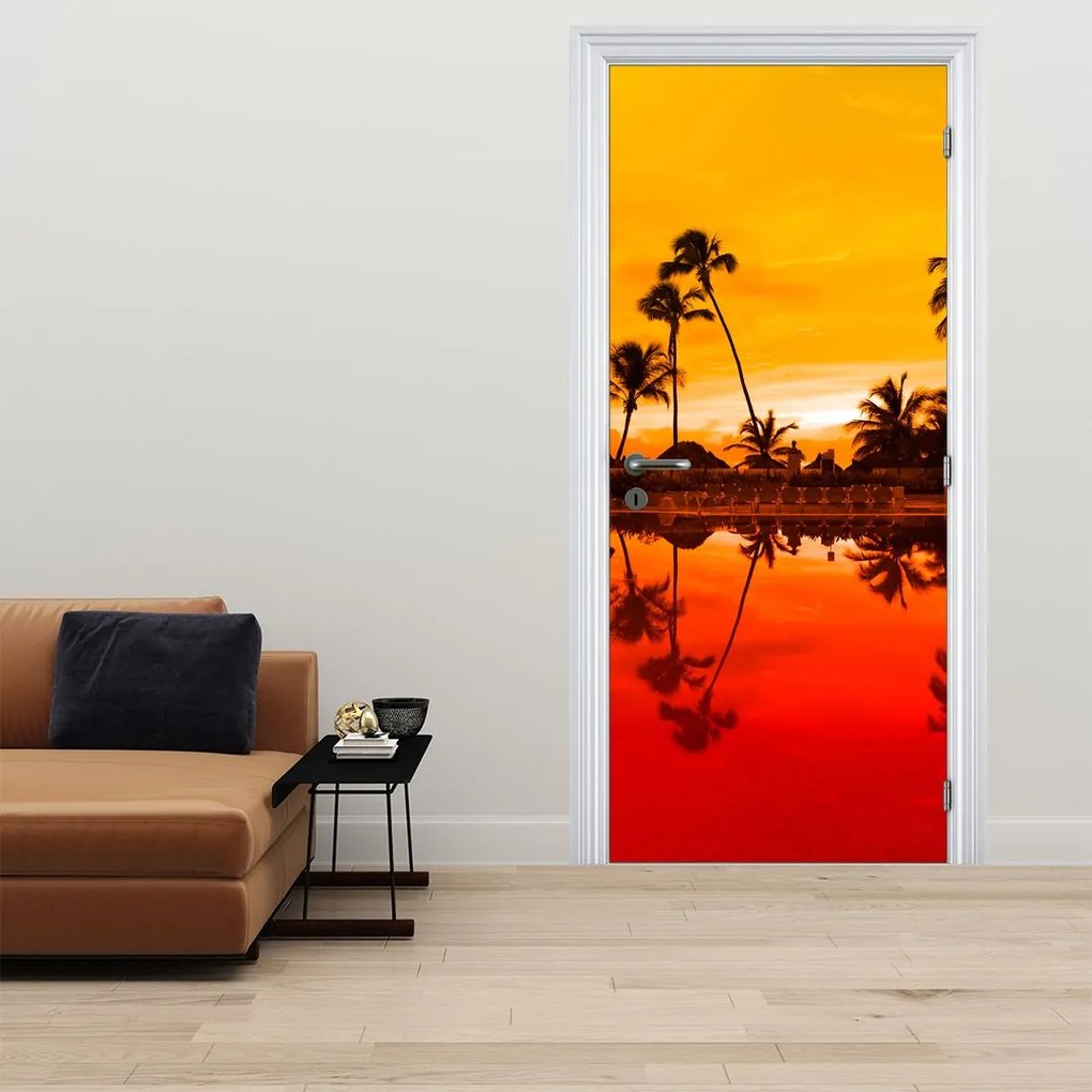Fototapeta na dvere - Západ slnka nad rezortom (95x205cm)