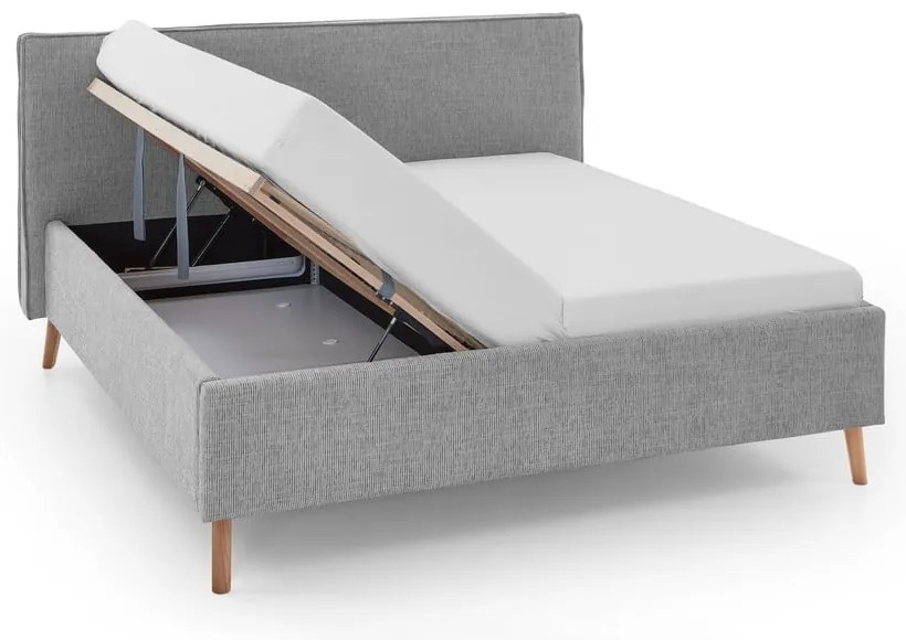 Svetlosivá čalúnená dvojlôžková posteľ s úložným priestorom s roštom 180x200 cm Riva – Meise Möbel