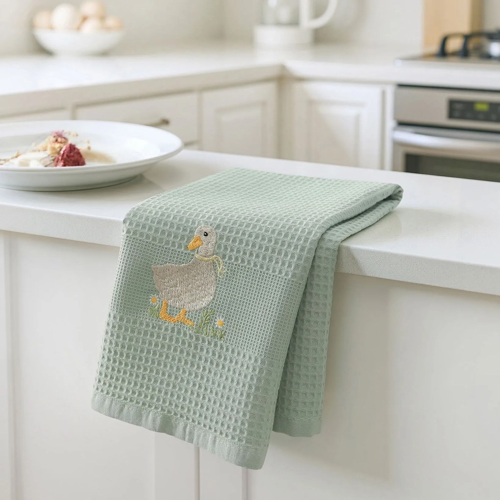 Goldea veľkonočná kuchynská vaflová utierka s výšivkou - kačica na šalviovom 50 x 70 cm