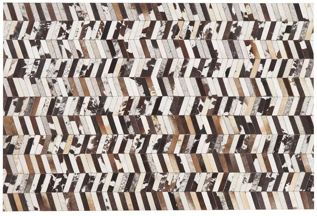 Kožený koberec 160 x 230 cm hnedá/biela AKYELE Beliani