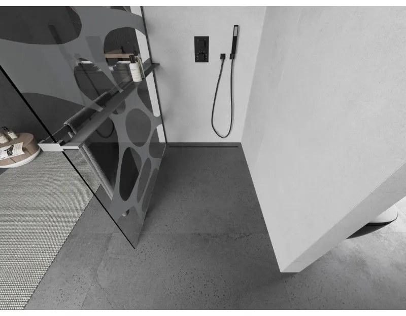 Mexen Kioto+ L, sprchová zástena Walk-In s poličkou a vešiakom 110 x 200 cm, 8mm číre sklo biely vzor, grafitový profil, 800-110-123-95-97