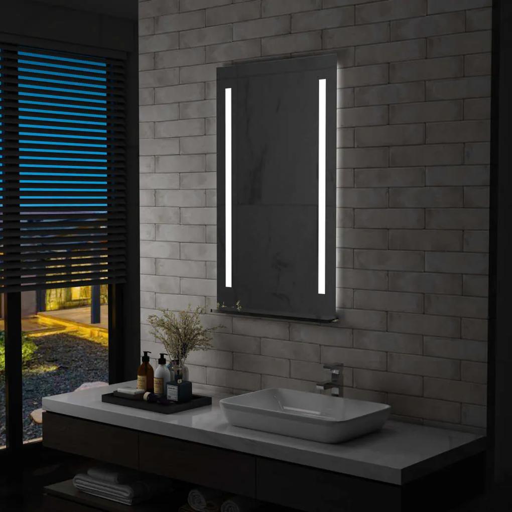 vidaXL Kúpeľňové LED nástenné zrkadlo s poličkou 60x100 cm