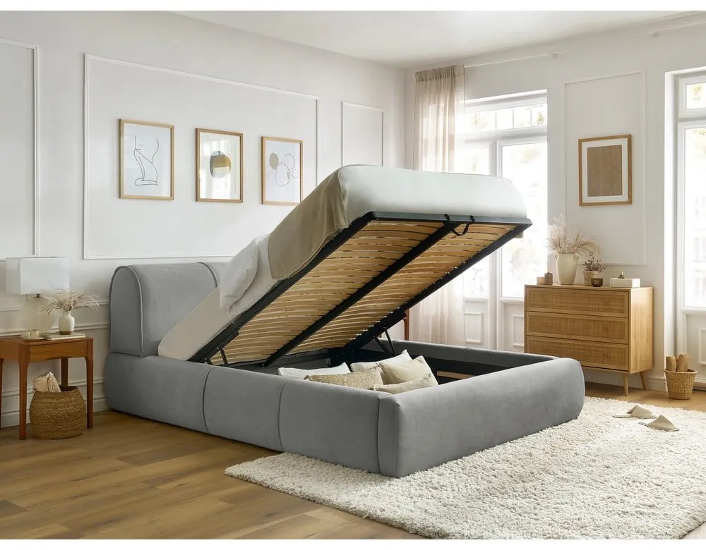 Svetlosivá čalúnená dvojlôžková posteľ s úložným priestorom s roštom 180x200 cm Vernon – Bobochic Paris