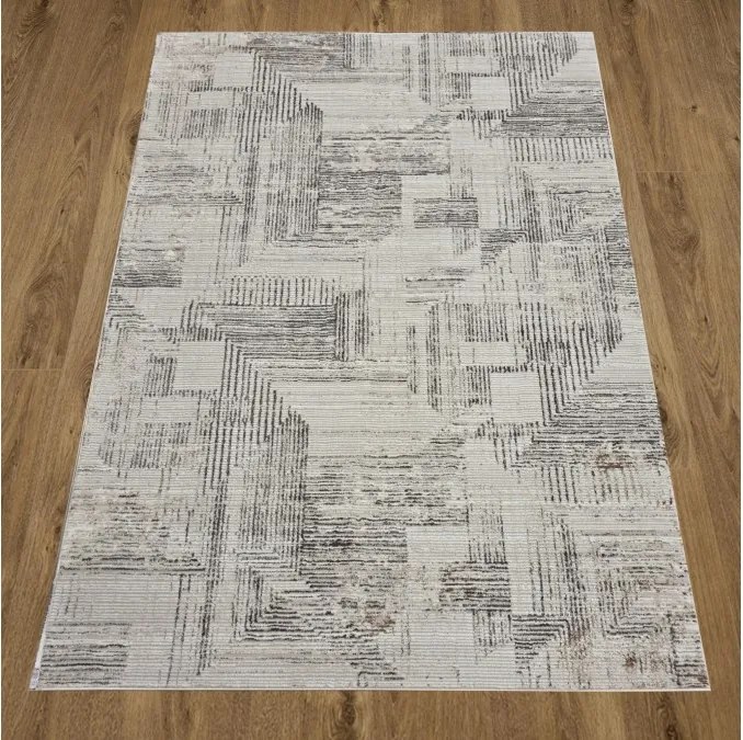 DC Koberec Oman 632 tmavá vizion zlatá Rozmer: 120×170 cm