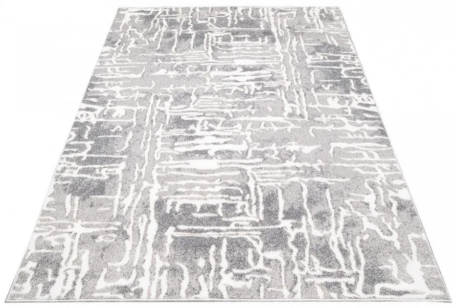 Sivý dizajnový koberec so svetlým abstraktným vzorom Šírka: 80 cm | Dĺžka: 150 cm